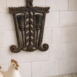 Vintage Cast Iron Trivet • Ornate Torch & Scroll Design, Rustic Decor