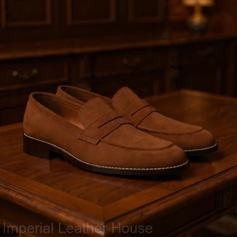 Handmade men’s suede loafers by Imperial Leather House featuring classic penny slip-on design, luxury
