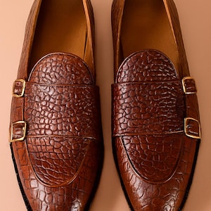 Handmade men’s leather loafers with crocodile texture and buckles