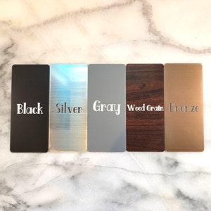 color options black, silver, gray, wood grain, bronze