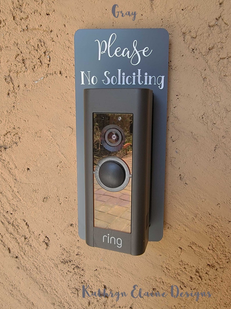 Ring doorbell with gray and white No Soliciting Sign
