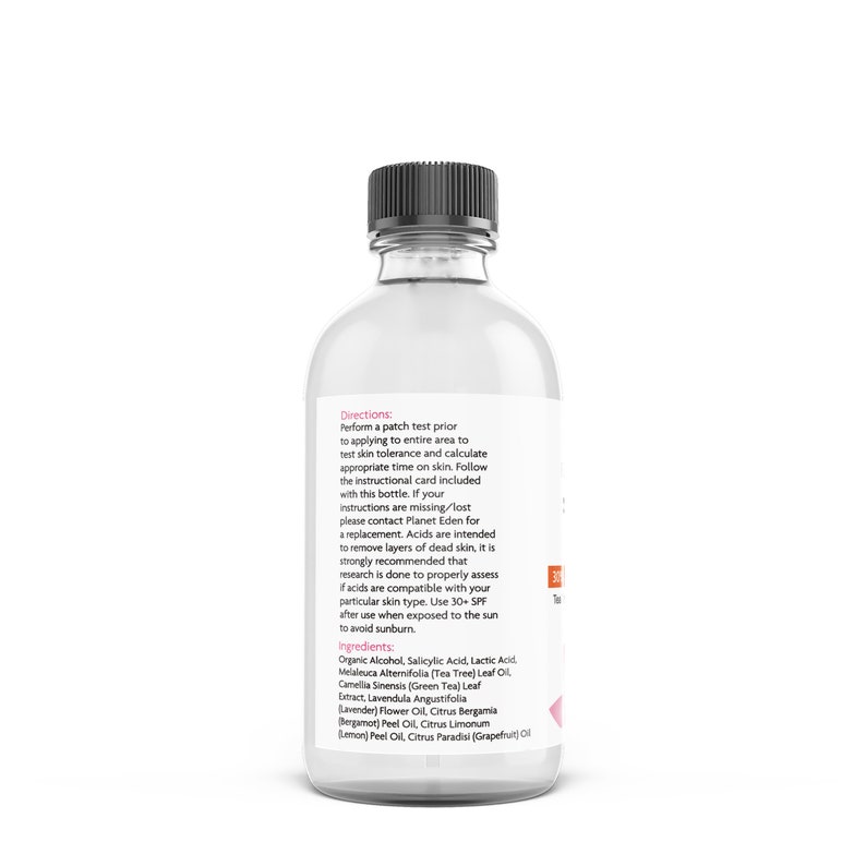 May include: A clear glass bottle with a black cap, containing a liquid. The label includes directions and ingredients, such as Organic Alcohol and Tea Tree Leaf Oil. The bottle is designed for skincare.