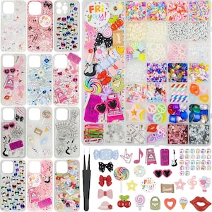 May include: A collection of sixteen clear phone cases decorated with various colorful charms, including lollipops, bows, and hearts, alongside a large rectangular organizer box filled with assorted craft beads, sequins, and miniature plastic embellishments.