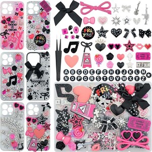 May include: A collection of phone cases and assorted decorative charms in pink, black, and silver. The set includes bows, hearts, stars, musical notes, sunglasses, alphabet letters, and miniature caution signs, along with a pair of black tweezers.