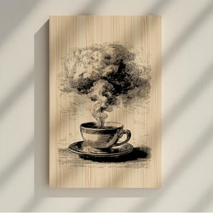 May include: A black and white illustration of a teacup and saucer with steam rising from the cup, resembling a cloud. The artwork is printed on a wooden panel with a light wood grain.