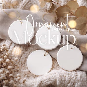 May include: Four circular white ornaments with gold hanging strings. The ornaments are blank and smooth, featuring a small hole at the top for suspension. The text Ornament Mockup PSD 1:1 Ratio and No 807 is visible over the image.