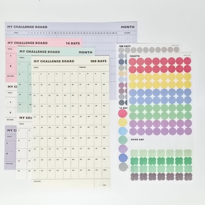 May include: A collection of challenge boards and sticker sheets. The boards are labelled "MY CHALLENGE BOARD" and "MONTH", with spaces for goals and scores. The sticker sheets feature colourful circles and flower shapes for tracking progress.