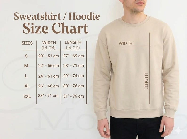 May include: A beige sweatshirt with a size chart. The chart shows measurements for width and length in inches and centimeters for sizes S to 2XL. The sweatshirt is shown on a person, with lines indicating width and length.