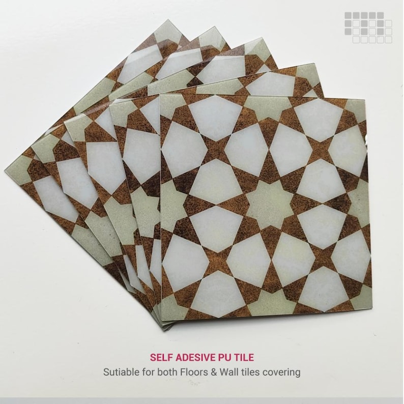 May include: A stack of self-adhesive PU tiles with a geometric star pattern in white, brown, and beige. The tiles are suitable for both floors and wall covering.