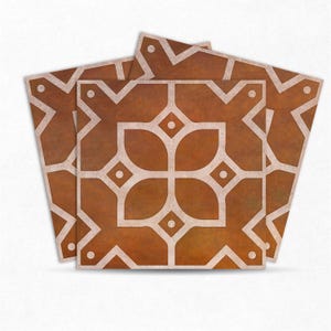 May include: Four square decorative tiles with a geometric pattern. The tiles have a warm brown background with a white, repeating design. The design includes floral and geometric shapes, creating a vintage aesthetic.