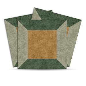 May include: A stack of square tiles with a textured surface. Each tile features a central tan square, surrounded by a gray border and a green outer edge. The tiles are arranged in a layered pattern, with a white background.
