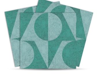 May include: A stack of square teal and light blue geometric art prints. Each print features a pattern of circles, triangles, and curved shapes. The prints have a textured, watercolor-like appearance and are arranged on a white background.