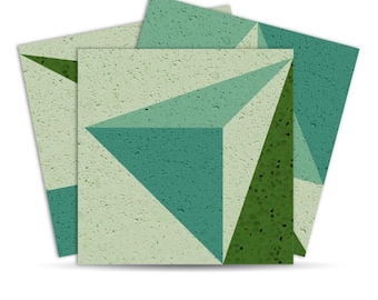 May include: A stack of square tiles with a geometric design. The tiles feature a textured surface and a pattern of triangles in shades of green and teal. The design creates a 3D effect.