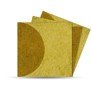 May include: A stack of three square coasters featuring a textured, mustard-yellow surface. Each coaster displays a large, dark-brown semi-circle graphic on the left side, creating a consistent geometric pattern across the layered set.