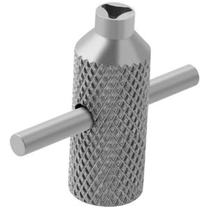 Op de afbeelding: Een zilverkleurig metalen T-handvatgereedschap met een cilindrisch lichaam en een gestructureerde handgreep met ruitpatroon. De bovenkant van het gereedschap heeft een driehoekige opening en een gladde metalen staaf loopt door het midden.