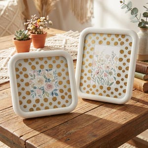 May include: A set of three ceramic mugs with a speckled, matte finish. The mugs are in shades of cream, light gray, and dark gray. Each mug has a simple, minimalist design, perfect for coffee or tea.