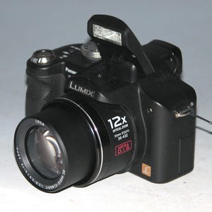 Panasonic LUMIX DMC-FZ8 7.2MP Digital Camera (New Battery & Charger)