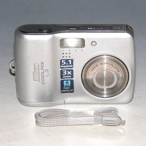 Nikon COOLPIX L3 5.1MP Digital Camera - Silver #4839 (Takes 2 AA Batteries)
