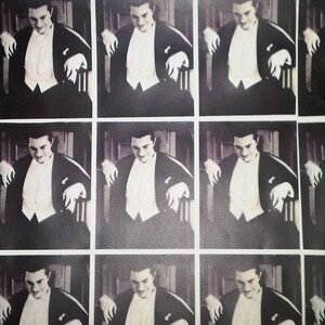 May include: A black and white photo collage of a man in a tuxedo, smiling and sitting in a chair. The photo is repeated nine times in a grid pattern.