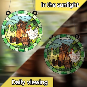 May include: Round stained glass window art featuring a bear, owl, duck, and chicken in a pastoral scene. The artwork is framed with a green border and includes the text "In the sunlight" and "Daily viewing".