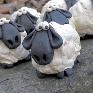 TidBits - Little sheep figurine with adorable worried eyes