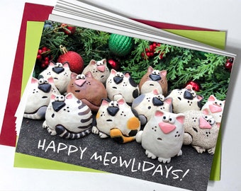 Happy MEOWlidays silly holiday card with festive kitties