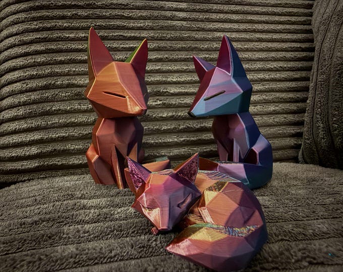 Handmade low-poly fox figurine – modern 3D printed decoration in rainbow design