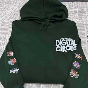 Den fantastiska digitala cirkusen broderad tröja och hoodie, TADC-karaktärsskjorta, cirkusfangåva