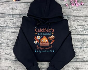 Sudadera y sudadera con capucha bordadas de El castillo ambulante de Howl, suéter Calcifer, productos de Studio Ghibli, regalo para amantes del anime.