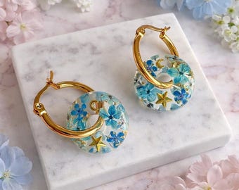 Blue Real Flower Resin Donut Hoop Earrings, Celestial Moon Star Botanical Jewellery