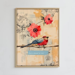 Pode incluir: Impressão de arte emoldurada com um pássaro colorido empoleirado em um galho, com flores vermelhas e o texto "You're allowed to rest." O fundo tem uma estética vintage com padrões florais e geométricos.