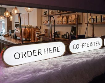 Enseigne lumineuse LED personnalisée | Logo double face pour façade commerciale