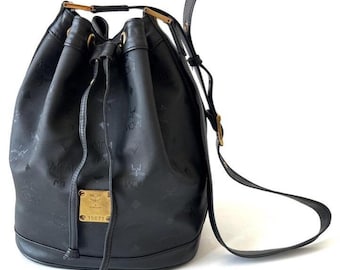 MCM ハンドバッグ　ブラック　ヴィンテージ 90 年代の本物のブラック MCM ハンドバッグ（エンボスロゴ付き）|高級