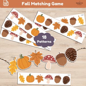 Può includere: Un gioco di abbinamento autunnale stampabile con 18 motivi su strisce rettangolari. I disegni includono illustrazioni di zucche arancioni, ghiande marroni, funghi rossi e bianchi, pigne marroni e foglie autunnali gialle e arancioni.