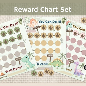 May include: A set of three reward charts with a dinosaur theme, featuring the text "You Can Do It!" and "Well Done!". Each chart has a different color scheme and includes dinosaur illustrations and paw print icons. Includes matching reward tokens.
