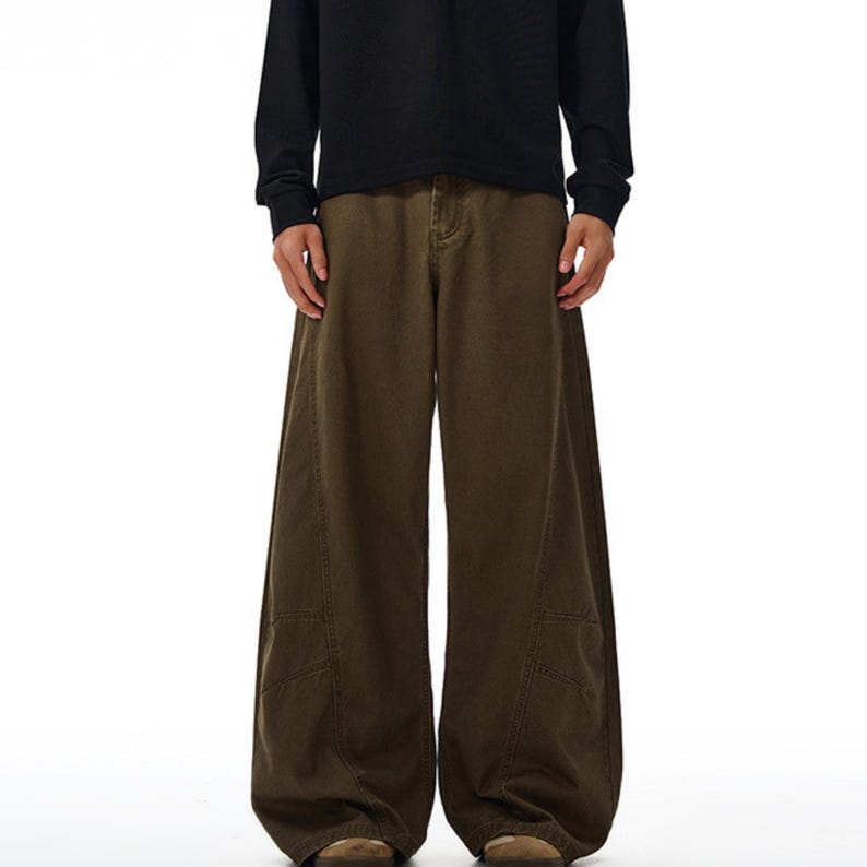 Drapey Baggy Pants | Casual Wide Leg Trousers | Daily Wear | Y2K Streetwear Style

Drapey baggy pants with wide leg design featuring loose fit silhouette and panel seam detailing, styled as casual trousers for daily wear and streetwear outfits with relaxed structure and comfortable movement