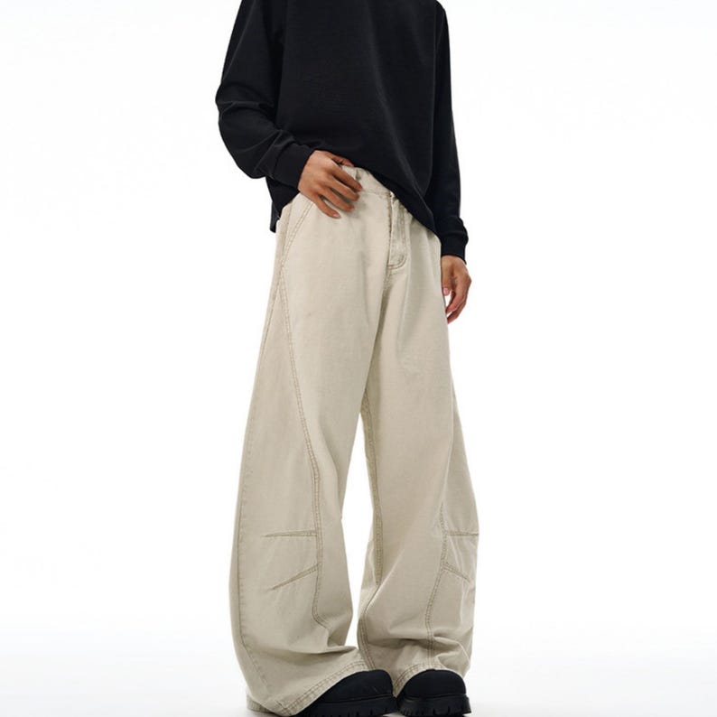 Drapey Baggy Pants | Casual Wide Leg Trousers | Daily Wear | Y2K Streetwear Style

Drapey baggy pants with wide leg design featuring loose fit silhouette and panel seam detailing, styled as casual trousers for daily wear and streetwear outfits with relaxed structure and comfortable movement