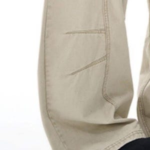 Drapey Baggy Pants | Casual Wide Leg Trousers | Daily Wear | Y2K Streetwear Style

Drapey baggy pants with wide leg design featuring loose fit silhouette and panel seam detailing, styled as casual trousers for daily wear and streetwear outfits with relaxed structure and comfortable movement