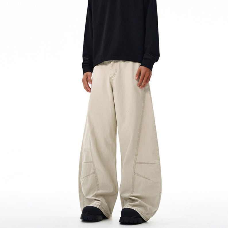 Drapey Baggy Pants | Casual Wide Leg Trousers | Daily Wear | Y2K Streetwear Style

Drapey baggy pants with wide leg design featuring loose fit silhouette and panel seam detailing, styled as casual trousers for daily wear and streetwear outfits with relaxed structure and comfortable movement