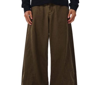 Drapey Baggy Pants | Casual Wide Leg Trousers | Daily Wear | Y2K Streetwear Style

Drapey baggy pants with wide leg design featuring loose fit silhouette and panel seam detailing, styled as casual trousers for daily wear and streetwear outfits with relaxed structure and comfortable movement