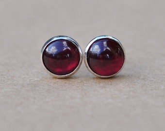 Genuine Garnet stud earrings handmade with Sterling Silver and 6mm natural red round cabochon gemstones.