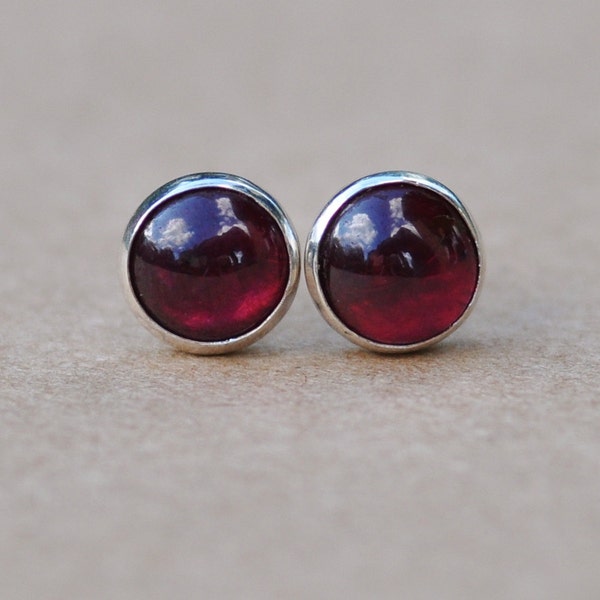 Genuine Garnet stud earrings handmade with Sterling Silver and 6mm natural red round cabochon gemstones.