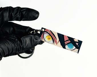 Llavero de ojos brillantes de Obanai Iguro / Llavero compatible con anime / Llavero de Demon Slayer Serpent Hashira