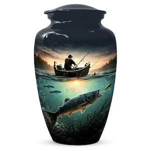 May include: A dark blue urn with a fishing scene. The image depicts a fisherman in a boat, a large fish underwater, and a sunset. The urn has a glossy finish and a rounded shape, suitable for storing cremated remains.