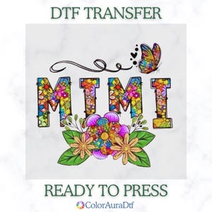 May include: DTF TRANSFER image with the word "MIMI" in colorful floral letters, a butterfly, and floral accents. The words "READY TO PRESS" are at the bottom. The ColorAuraDtf logo is at the bottom.