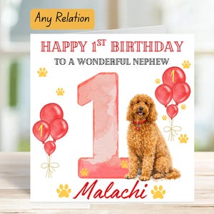 May include: A birthday card with the text "Happy 1st Birthday to a Wonderful Nephew." The card features a watercolor-style number one, red balloons, paw prints, and a brown dog with a red collar. The name "Malachi" is written in red.