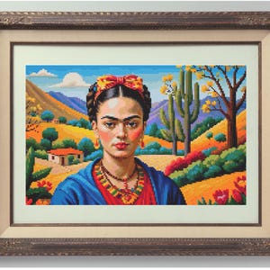 May include: Framed pixel art portrait of a woman with a floral headband and jewelry, set against a colorful landscape with mountains, cacti, and a small house. The artwork is in a brown ornate frame.