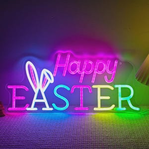 Happy Easter neon sign bunny LED light displayed as glowing Easter wall decor for home, seasonal holiday decoration, and spring room styling