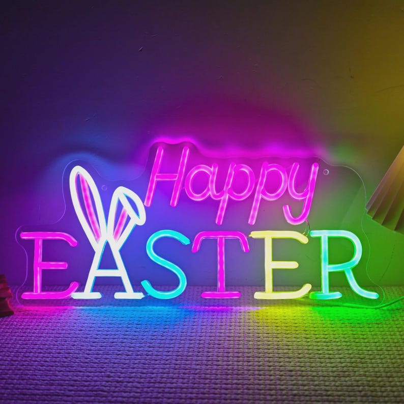 Happy Easter neon sign bunny LED light displayed as glowing Easter wall decor for home, seasonal holiday decoration, and spring room styling