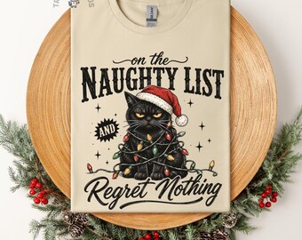 On The Naughty List Regret Nothing Black Cat Christmas Shirt, Funny Christmas Cat Sweatshirt, Cat Lover Holiday Gift